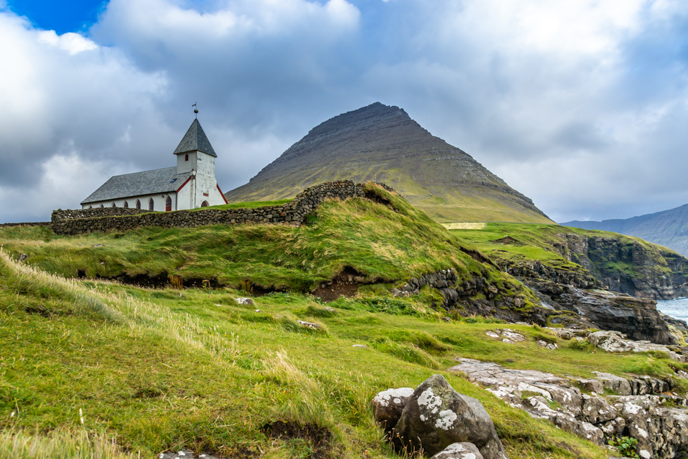 Lonely church near Viareii village, Viooy island, Faeroe islands, Denmark, Europe