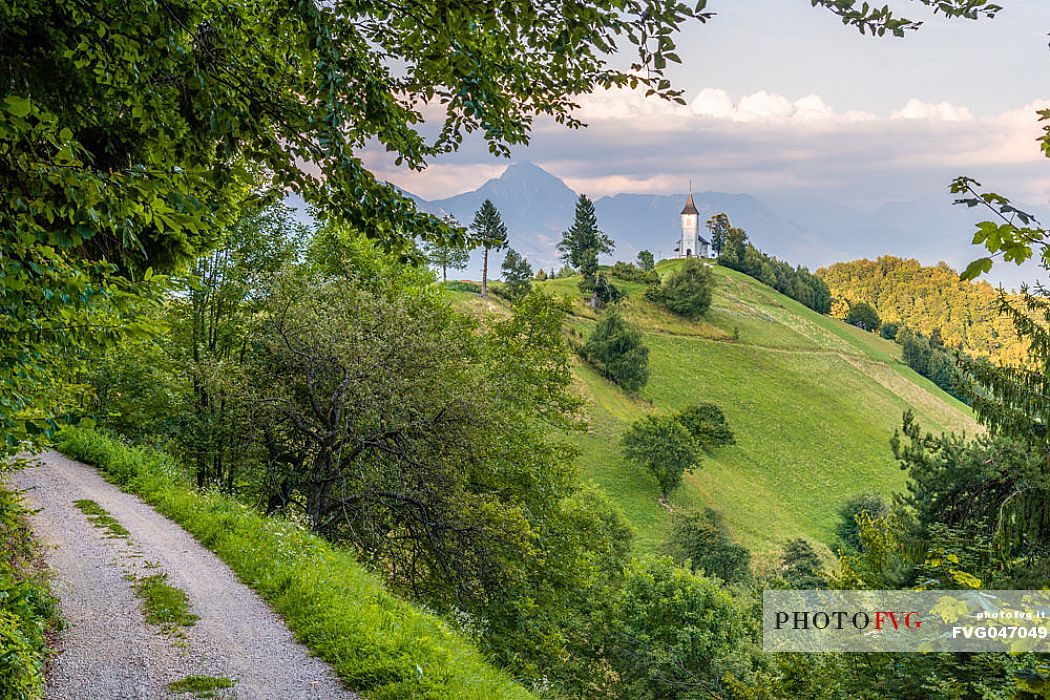 Saints Primus and Felician Church near Jamnik and Kroper with Storzic mountain in the background, Kranj, Upper Carniola, Slovenia, Europe