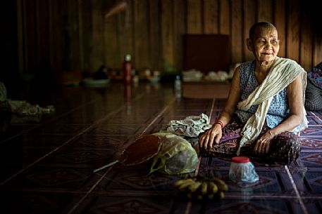 Old woman in a temple