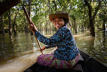 Woman on a boat at Kompong Pluk
