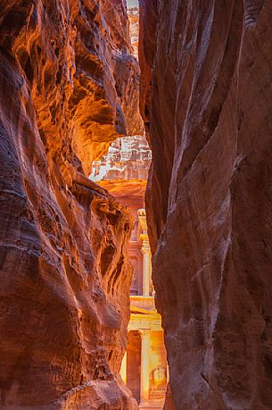 Light in the ancient city Petra through the narrow canyon, Jordan