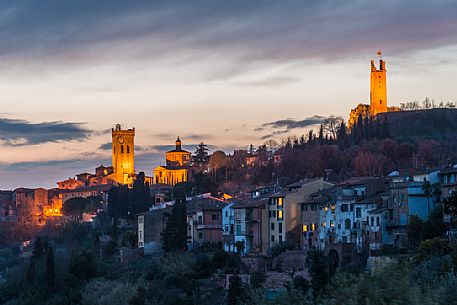 Twilight on the hills of San Miniato with Matilde and Federico II towers illuminated, Tuscany, Italy