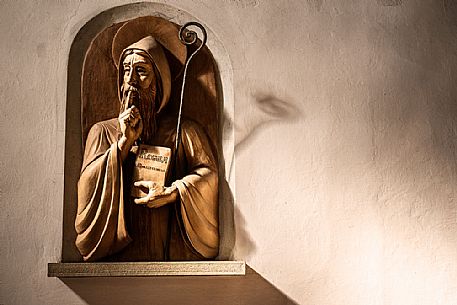 Statue in the San Martino church, Agliati, Tuscany, Italy