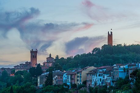Twilight on the hills of San Miniato with Matilde and Federico II towers illuminated, Tuscany, Italy