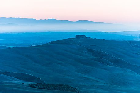 Crete Senesi landscapes at the twilight, Orcia valley, Tuscany, Italy Crete Senesi landscapes at the twilight, Orcia valley, Tuscany, Italy