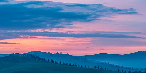 Crete Senesi landscape at twilight, Orcia valley, Tuscany, Italy