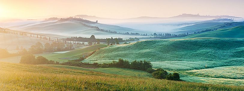 Crete Senesi landscape at sunrise, Orcia valley, Tuscany, Italy