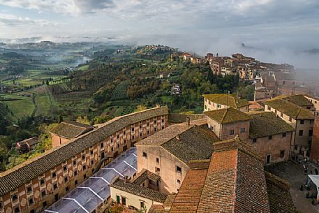 Foggy morning in San Miniato village, Tuscany, Italy