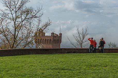 Tourists looking the Torre di Matilde tower form the torre Federico II tower in San Miniato, Tuscany, Italy Tourists looking the Torre di Matilde tower form the torre Federico II tower in San Miniato, Tuscany, Italy
