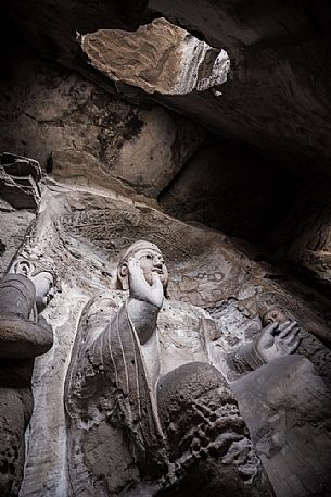 The beautiful ancient remains of Buddha Statue in Yungang Grottoes, Datong, Shanxi Province, China