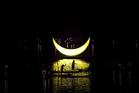 Evening showtime, the stunning scenery of the Li River sets the stage for the Liu San Jie or Sanjie Liu Impression Light Show, Yangshuo, Guangxi, China Evening showtime, the stunning scenery of the Li River sets the stage for the Liu San Jie or Sanjie Liu Impression Light Show, Yangshuo, Guangxi, China