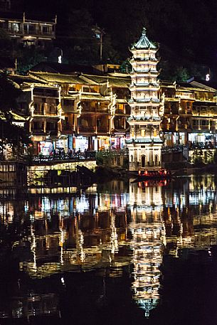 Night view of ancient town of Fenghuang or Phoenix with Wanming pagoda, Hunan, China