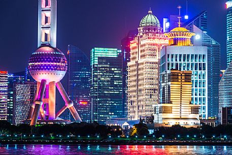 Lujiazui Financial District skyline with Oriental Pearl Tower by night in Shanghai city, China