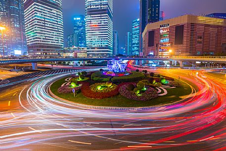 Night view of a road in Lujiazui New Financial District of Shanghai city, China Night view of a road in Lujiazui New Financial District of Shanghai city, China
