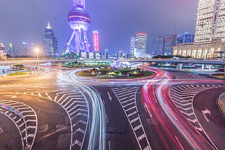 Night view of a roads in Lujiazui New Financial District with Oriental Pearl Tower in Shanghai city, China