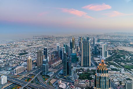 Sunrise from the top panoramic platform on Burj Khalifa across Sheikh Zayed Road and the high rises, Downtown Dubai, Emirate of Dubai, UAE, Asia