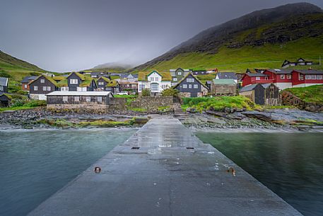 Seaport and the colourful houses of Boufr village, Srvgur, Faeroe Islands, Denmark, Europe