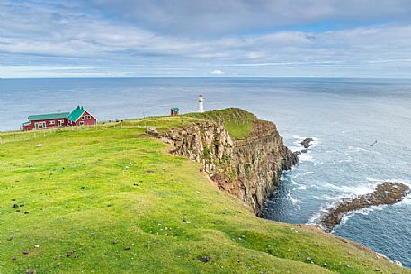 Akraberg Lighthouse near Sumba village, Suðuroy island, Faeroe Islands, Denmark, Europe Akraberg Lighthouse near Sumba village, Suðuroy island, Faeroe Islands, Denmark, Europe