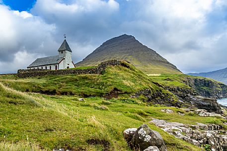 Lonely church near Viareii village, Viooy island, Faeroe islands, Denmark, Europe
