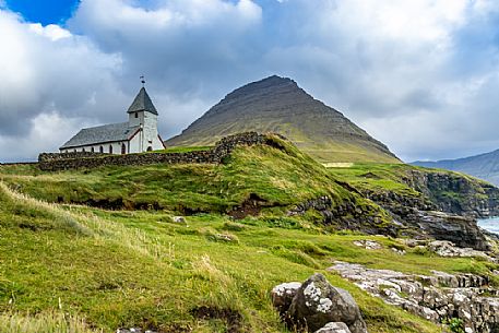 Lonely church near Višareiši village, Viooy island, Faeroe islands, Denmark, Europe Lonely church near Višareiši village, Viooy island, Faeroe islands, Denmark, Europe