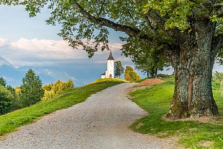 Saints Primus and Felician Church near Jamnik and Kroper with Storzic mountain in the background, Kranj, Upper Carniola, Slovenia, Europe