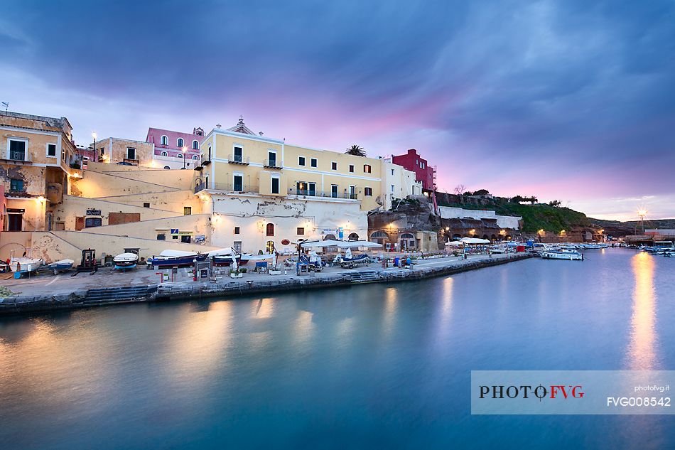 Old houses and roman harbor in Ventotene at sunset