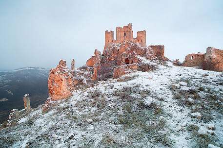 Rocca Calascio, a beautiful medieval castle that rise above an abandoned village, in the cold winter silence, Gran Sasso and Monti della Laga national park