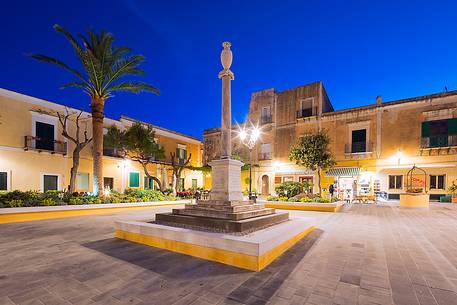 Old houses in the central square of Ventotene in the twilight