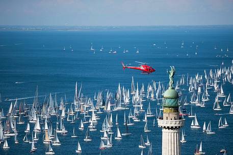 Helicopter on the top of the boats before the departure of Barcelona regatta, Trieste, Italy