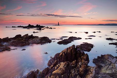 Isle of Sant'antioco. Location Mangiabarche with its typical small and famous lighthouse, Sulcis-Iglesiente, Sardinia, Italy Isle of Sant'antioco. Location Mangiabarche with its typical small and famous lighthouse, Sulcis-Iglesiente, Sardinia, Italy