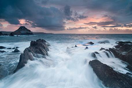 The famous Nebida coast at sunset in the background the 