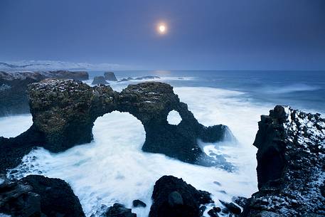 characteristic cliff overlooking the sea, illuminated by the moonlight