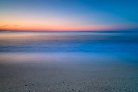 Pastel colors at sunset in this ethereal sea in Piscinas, Arbus, Sardinia, Italy