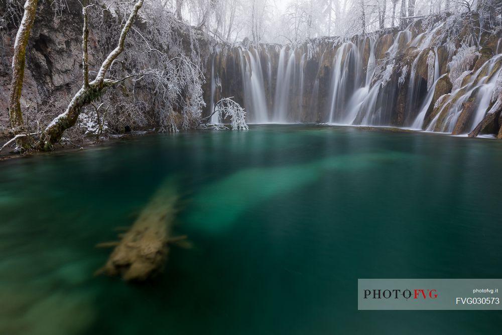 Winter waterfall in Plitvice Lakes National Park, Lika-Senj County, Karlovac County, Croatia.