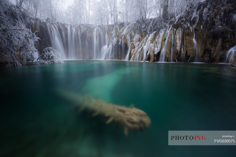 Winter waterfall in Plitvice Lakes National Park, Lika-Senj County, Karlovac County, Croatia.