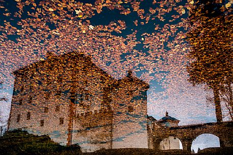 Reflection of Snenik Castle on autumn, Slovenia