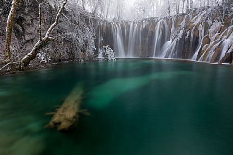 Winter waterfall in Plitvice Lakes National Park, Lika-Senj County, Karlovac County, Croatia. Winter waterfall in Plitvice Lakes National Park, Lika-Senj County, Karlovac County, Croatia.