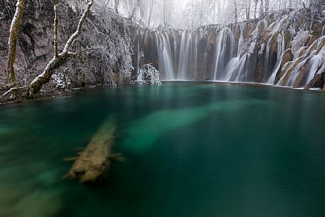 Winter waterfall in Plitvice Lakes National Park, Lika-Senj County, Karlovac County, Croatia.