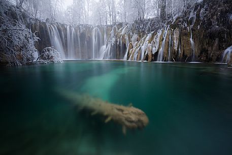 Winter waterfall in Plitvice Lakes National Park, Lika-Senj County, Karlovac County, Croatia.