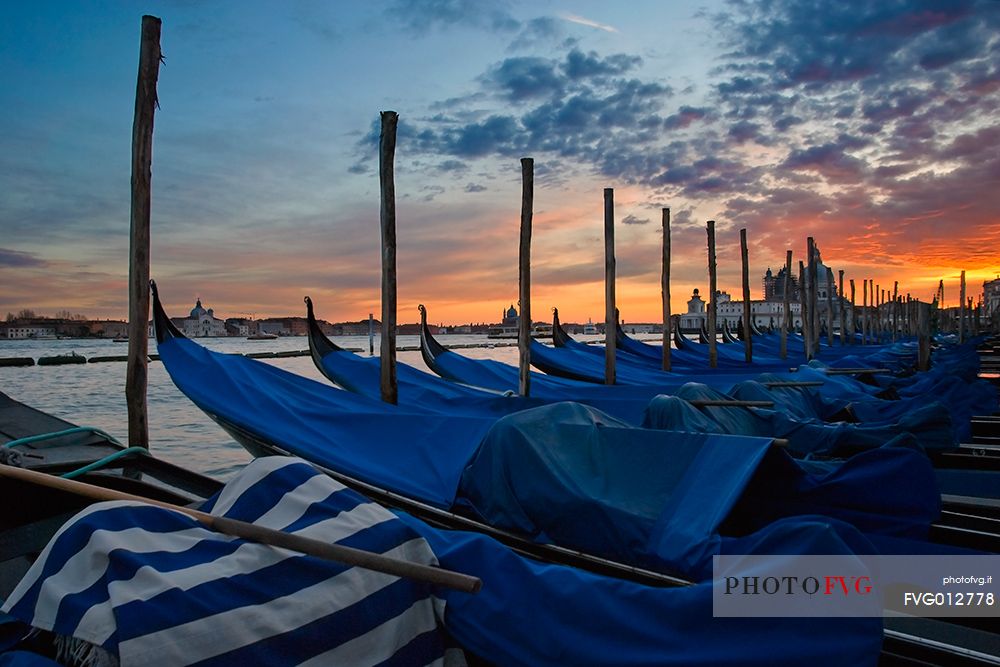 Gondolas near San Marco's square, in the background the San Giorgio Maggiore Basilica, Venice, Veneto, Italy, Europe