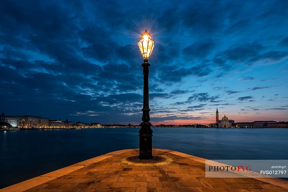 View of the historic palaces of Venice from Punta della Dogana at twilight, Venice, Italy, Europe