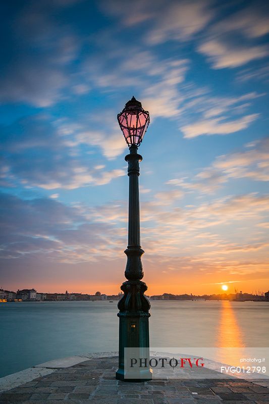 View of the historic palaces of Venice from Punta della Dogana at sunrise, Venice, Italy, Europe