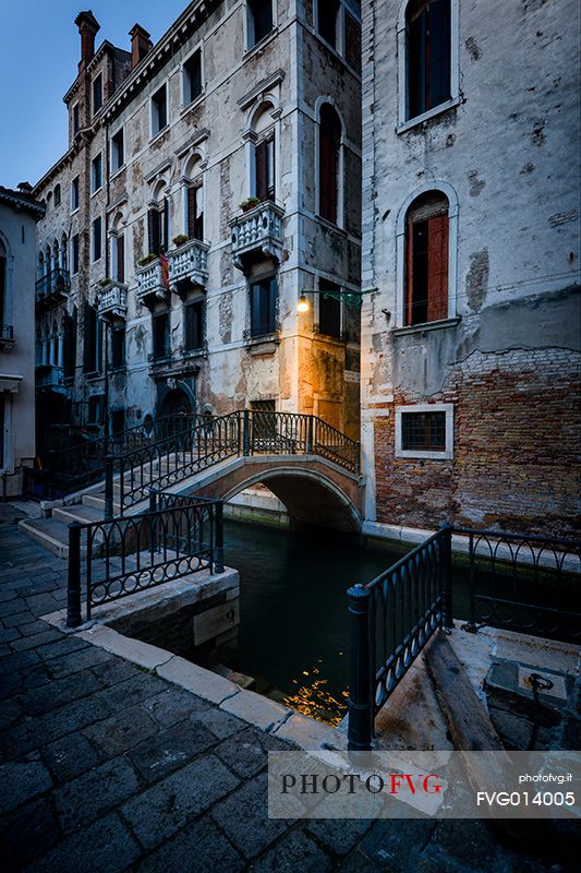 View of bridge and calle in Venice at twilight, Venice, Italy, Europe