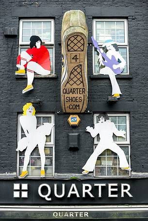 Typical exterior facade of a shop in Camden Town, London, England, United Kingdom, Europe
