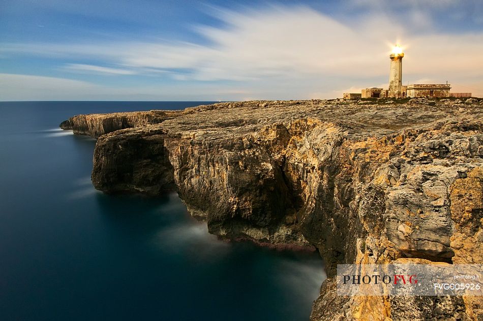 The lighthouse on the cliffs of Capo Murro di Porco, Plemmirio Natural Reserve