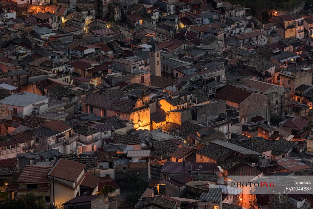 Overhead view of village of Mammola, characteristic for the stocco fish, photographed at the first light of the night, Aspromonte national park, Calabria, Italy, Europe