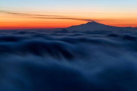 The Etna volcano over cloud from Aspromonte National Park