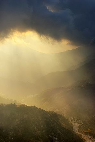 Sunset on Fiumara Sant'Agata in a foggy day, Aspromonte national park, Calabria, Italy