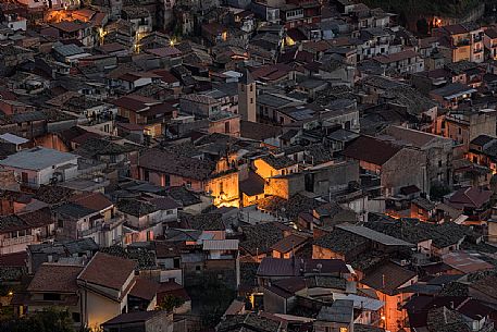 Overhead view of village of Mammola, characteristic for the stocco fish, photographed at the first light of the night, Aspromonte national park, Calabria, Italy, Europe
