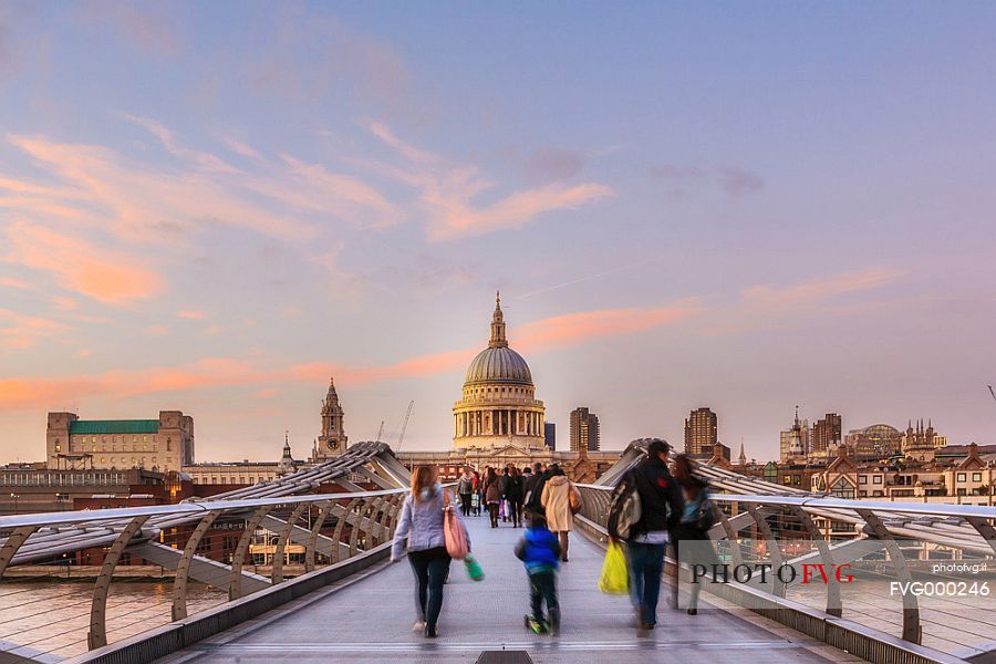 Millennium Bridge and St. Paul's Cathedral with tourist